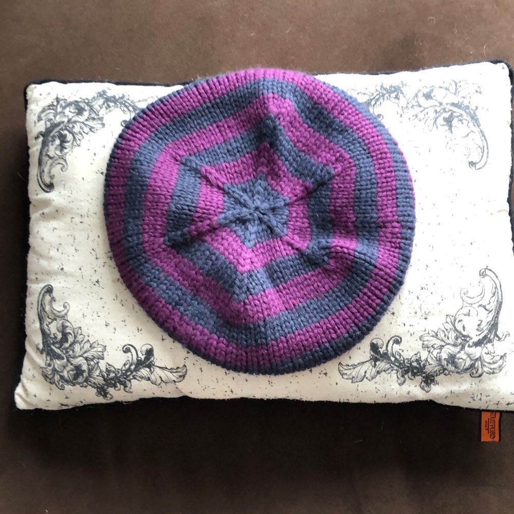 Purple striped beret.